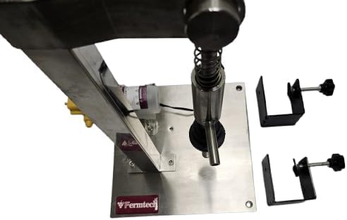Fermtech Automatic Bottle Fller. For bottling wine, beer, kimbucha, juices, etc. Fill 5 Bottles per Minute. Stainless Steel Design Made in Canada Foods Safe Tubing.