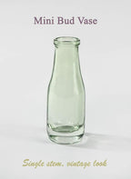 Serene Spaces Living Mini Green Glass Bud Vase, Centerpiece for Wedding Reception, Mini Flower Vases for Home Decor, Vintage Bottle Style Vase, Pack of 48