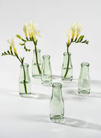 Serene Spaces Living Mini Green Glass Bud Vase, Centerpiece for Wedding Reception, Mini Flower Vases for Home Decor, Vintage Bottle Style Vase, Pack of 48