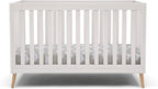 Delta Children Essex Crib 6-Piece Baby Nursery Furniture Set–Includes: Convertible Crib, 6 Drawer Dresser, Changing Top, Crib Mattress, Sheets, & Changing Pad, Bianca White w/Natural