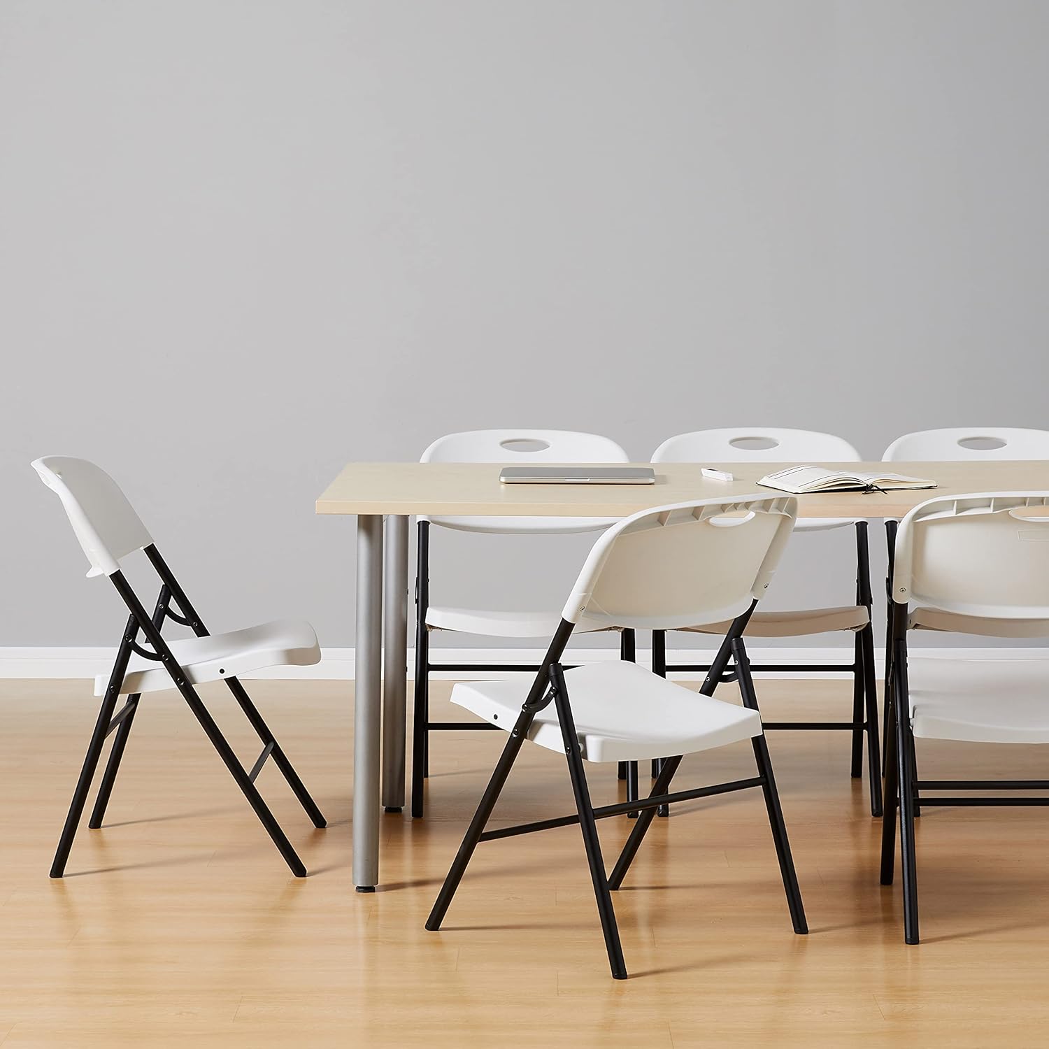 Amazon Basics Sturdy Foldable Portable Plastic Chair, 350-Pound Capacity, Space Saving for Events and Seating, White, 6-Pack