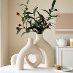 Liotww Snuggle Hollow Hug Donut Ceramic Vase, 8.3 Inch Modern Nordic Boho Style Aesthetic Decorative Flower Vases for Home Decor Pottery Barn Dining Living Room Table Shelf (Milky White)