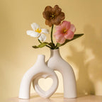 Liotww Snuggle Hollow Hug Donut Ceramic Vase, 8.3 Inch Modern Nordic Boho Style Aesthetic Decorative Flower Vases for Home Decor Pottery Barn Dining Living Room Table Shelf (Milky White)