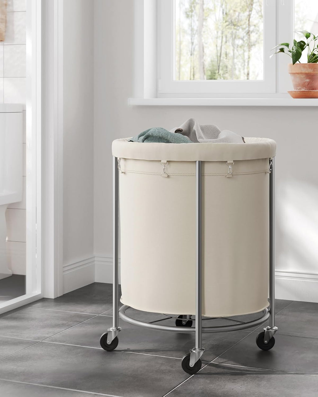 SONGMICS 50.2-Gallon (190 L) Laundry Basket with Wheels, Rolling Round Heavy-Duty Laundry Hamper Cart with Steel Frame and Removable Bag, 2 Locking, White and Metallic Silver, URLS01MZ