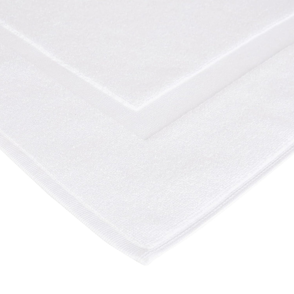 Amazon Basics Non-Slip Cotton Bath Mat, 100% Cotton Absorbent, Machine Washable, 31" L x 20" W, Bright White