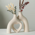Liotww Snuggle Hollow Hug Donut Ceramic Vase, 8.3 Inch Modern Nordic Boho Style Aesthetic Decorative Flower Vases for Home Decor Pottery Barn Dining Living Room Table Shelf (Milky White)