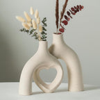 Liotww Snuggle Hollow Hug Donut Ceramic Vase, 8.3 Inch Modern Nordic Boho Style Aesthetic Decorative Flower Vases for Home Decor Pottery Barn Dining Living Room Table Shelf (Milky White)