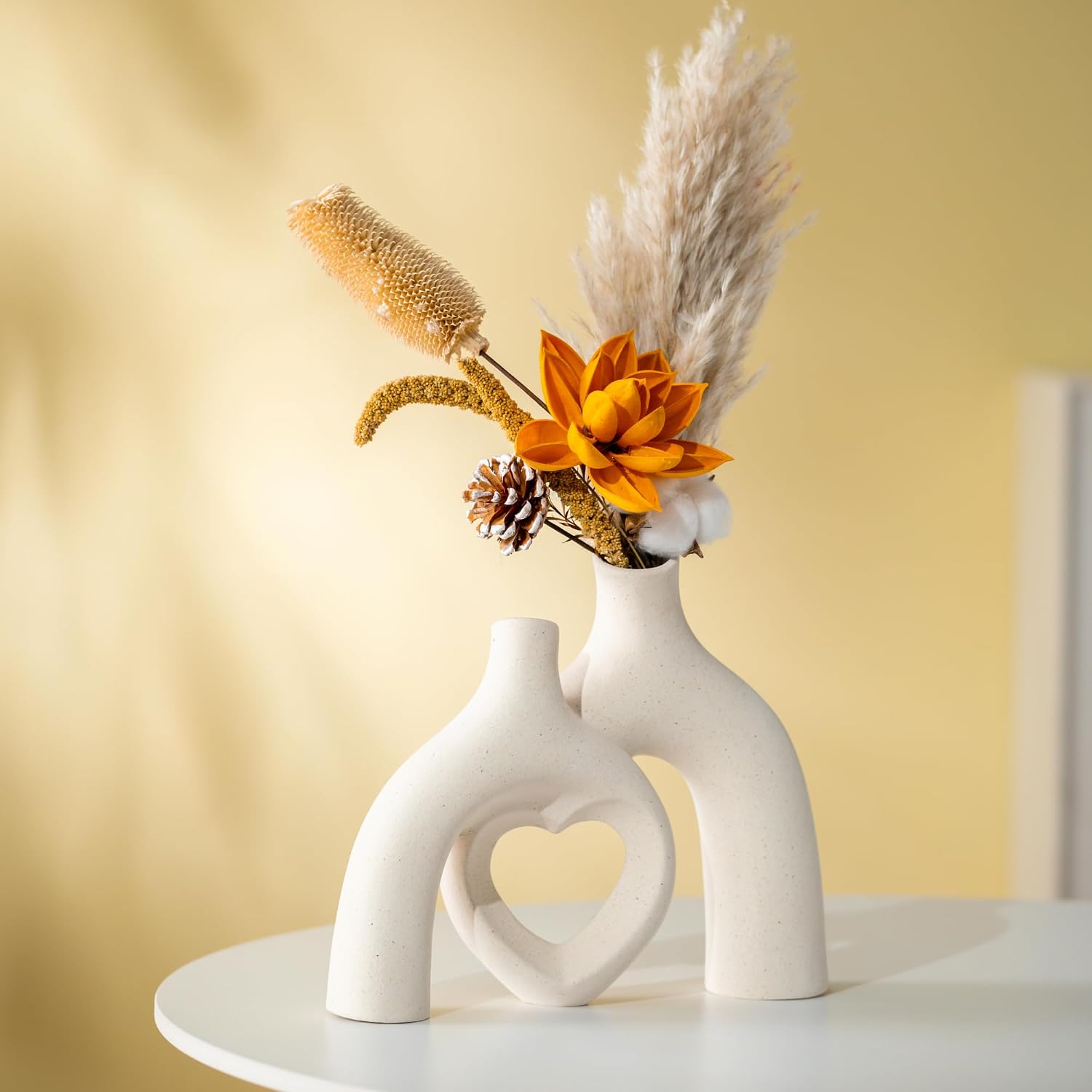 Liotww Snuggle Hollow Hug Donut Ceramic Vase, 8.3 Inch Modern Nordic Boho Style Aesthetic Decorative Flower Vases for Home Decor Pottery Barn Dining Living Room Table Shelf (Milky White)