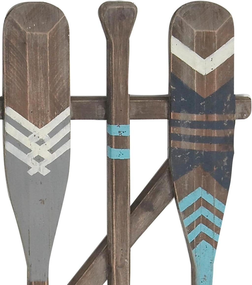 Deco 79 Wood Paddle Home Wall Decor Novelty Canoe Oar Wall Sculpture with Arrow and Stripe Patterns, Wall Art 21" x 2" x 36", Brown