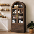71" Tall Arched Kitchen Pantry Cabinet, Modern Farmhouse Kitchens Storage Cabinet with 2 Large Drawers & Glass Doors, Freestanding Versatile Cupboard for Living Room, Dining Room, Brown