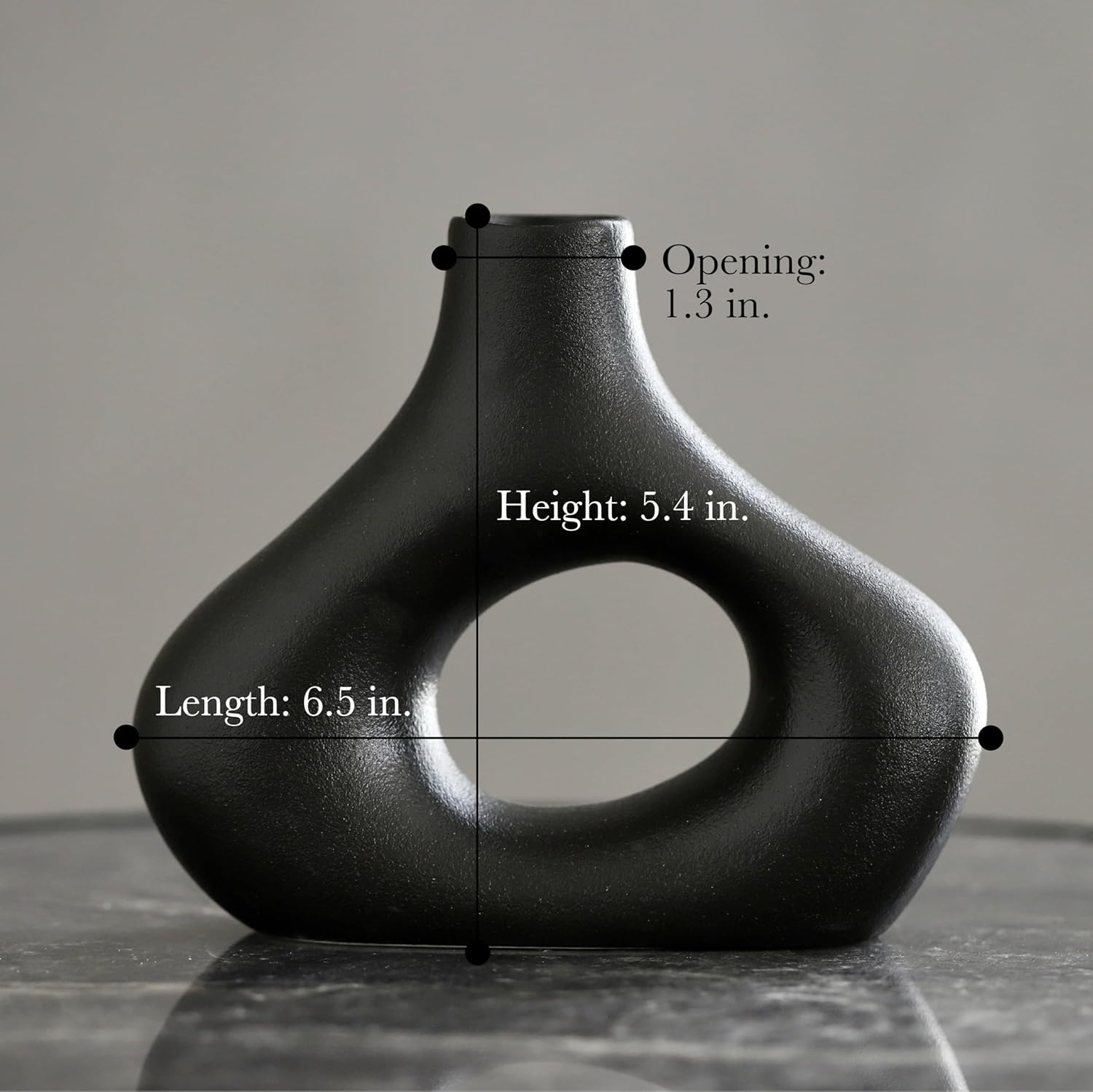 Carrot's Den Black Ceramic Modern Vase Set of 2, Donut Shelf Decor, Black | Pair for bookshelf and bookcase decor, mantel styling, or home staging. Holds dried stems and faux plants indoor.