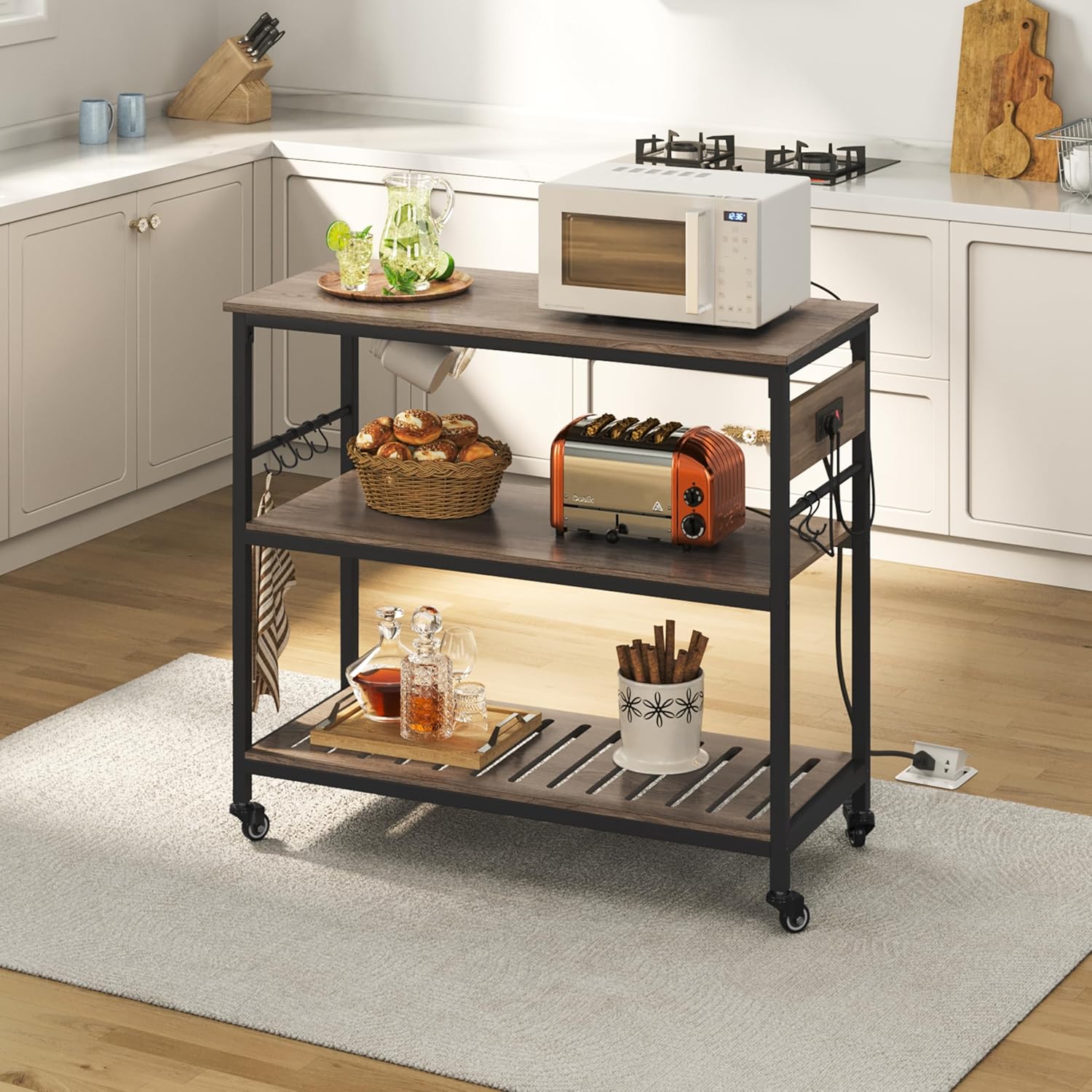 Yaheetech Kitchen Island Cart with Power Outlet, Kitchen Carts on Wheels with Storage, 3-Tier Microwave Stand with Foodpads, Glass and Mug Holders, 8 Hooks, Taupe Wood
