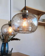 CASAMOTION Hand Blown Clear Glass Pendant Lights with Black Marble, Modern Rustic Kitchen Island Ceiling Hanging Light Fixtures for Dining Room Table Bedroom, Oval Globe 8.7 Inch Diameter, 2 Pack