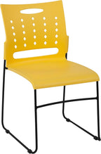 EMMA + OLIVER 881 lb. Capacity Yellow Sled Base Stack Chair with Air-Vent Back