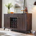 OKD Fluted Wine Bar Cabinet, 60" Wide Modern Buffet Sideboard with Ample Storage - 2 Side Cabinets, 3 Drawers, 4 Glass Holders & 12 Wine Racks, Coffee Bar Cabinet for Kitchen, Dining Room, Dark Walnut