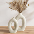 LE TAUCI Ceramic Vases Set of 2, Cream Hollow Donut Flower Vases, Nordic Boho Decor Decorative Centerpiece for Living Room, Table, Shelf, Mantel, Warm Ivory Speckled (H10.5”xW8.5”)