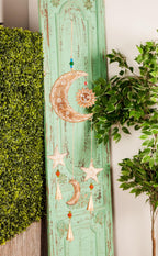 Deco 79 Mango Wood Sun and Moon Windchime with Glass Beads and Cone Bells, 7" x 1" x 27", Gold