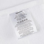 Amazon Basics Non-Slip Cotton Bath Mat, 100% Cotton Absorbent, Machine Washable, 31" L x 20" W, Bright White