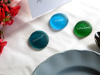 The Mermaid's Message I, Frosted Sea Glass Stones, Six Inspiring Words in Beach Colors, by Lifeforce Glass.