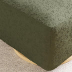 Babyletto Kiwi Gliding Ottoman in Olive Boucle with Light Wood Base, Greenguard Gold and CertiPUR-US Certified