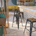 EMMA + OLIVER Commercial Grade 30" H Backless Distressed Black Metal Indoor-Outdoor Barstool